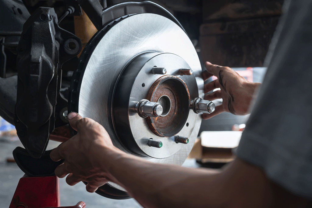 auto mechanic fixing breaks on car automotive maintence harvey la gretna la