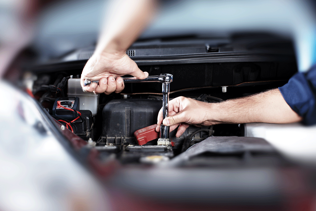 auto mechanic using wrench to fix car automotive maintenance | gretna la harvey la 